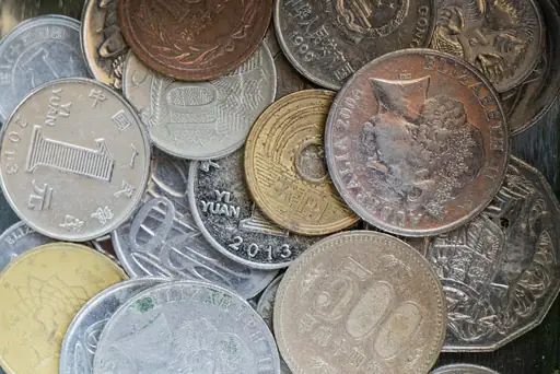Wie bekommt man Münzen sauber? Münzen reinigen: Schonende Methoden für verschiedene Metalle